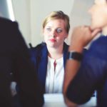 a person talking to people