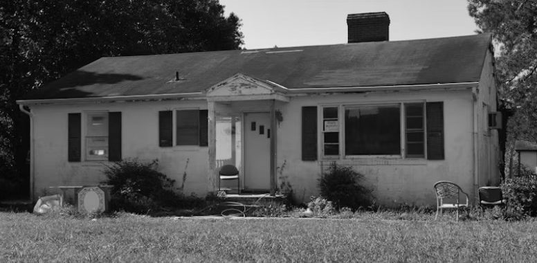 a distressed home in a town