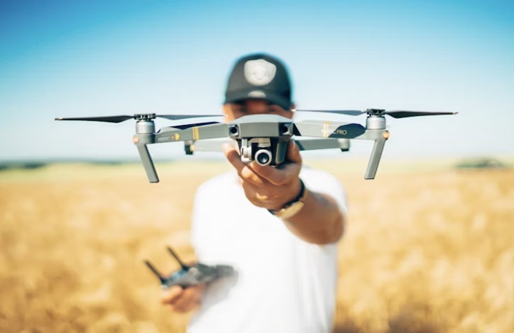 a person holding a drone
