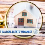 a person holding a magnifying glass over a little house