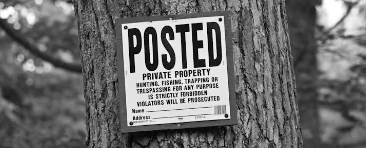 a posted no trespassing sign