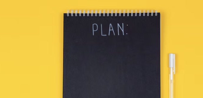 a checklist that says the word plan on it
