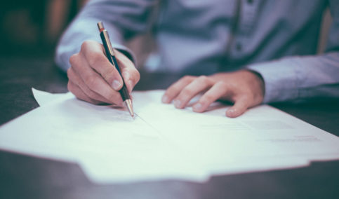 realtor writing a contract